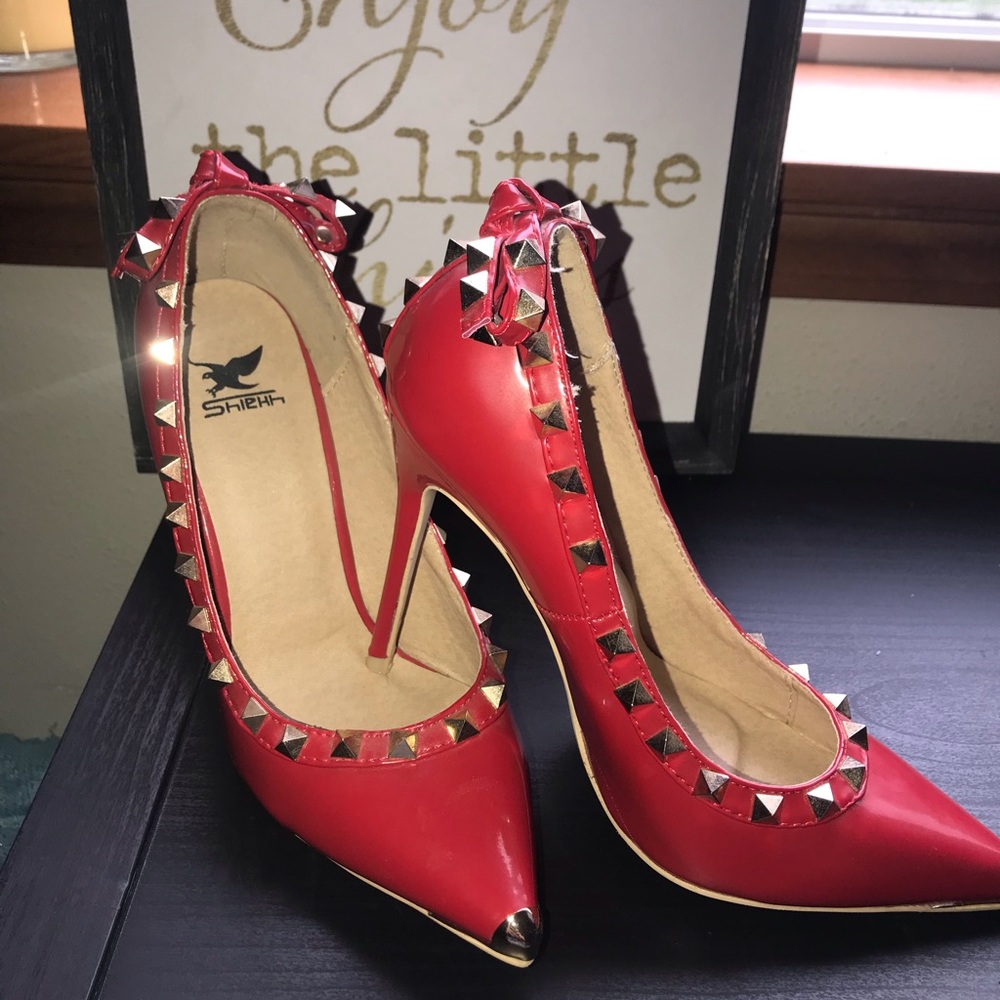 Spike studded red heels